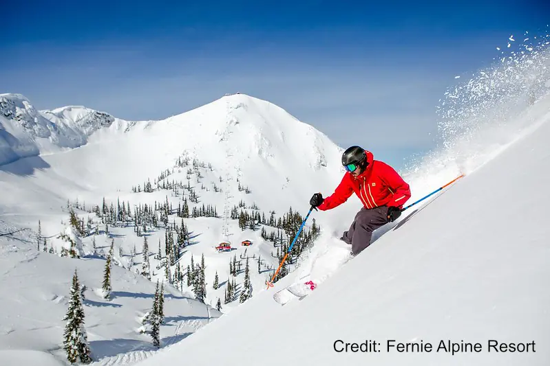 skier on steep powder slope at Fernie resort