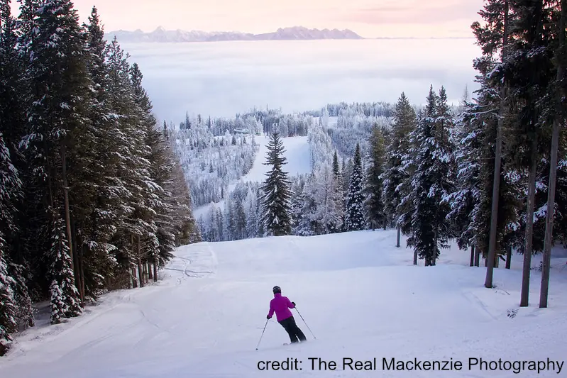 woman skiing a groomed run at Kimberly in the late afternoon