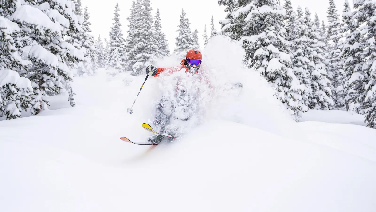 skier in deep powder at Winter Park Resort, Colorado